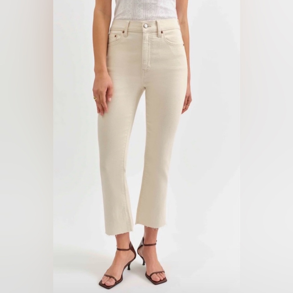 Daze brand high-rise flare leg cropped jeans in a cream color raw hem size 29